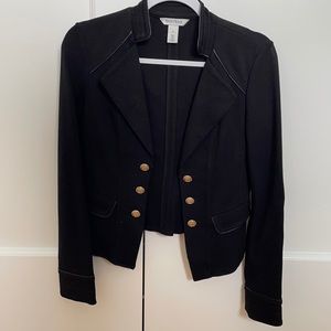 A great black blazer with gold buttons.